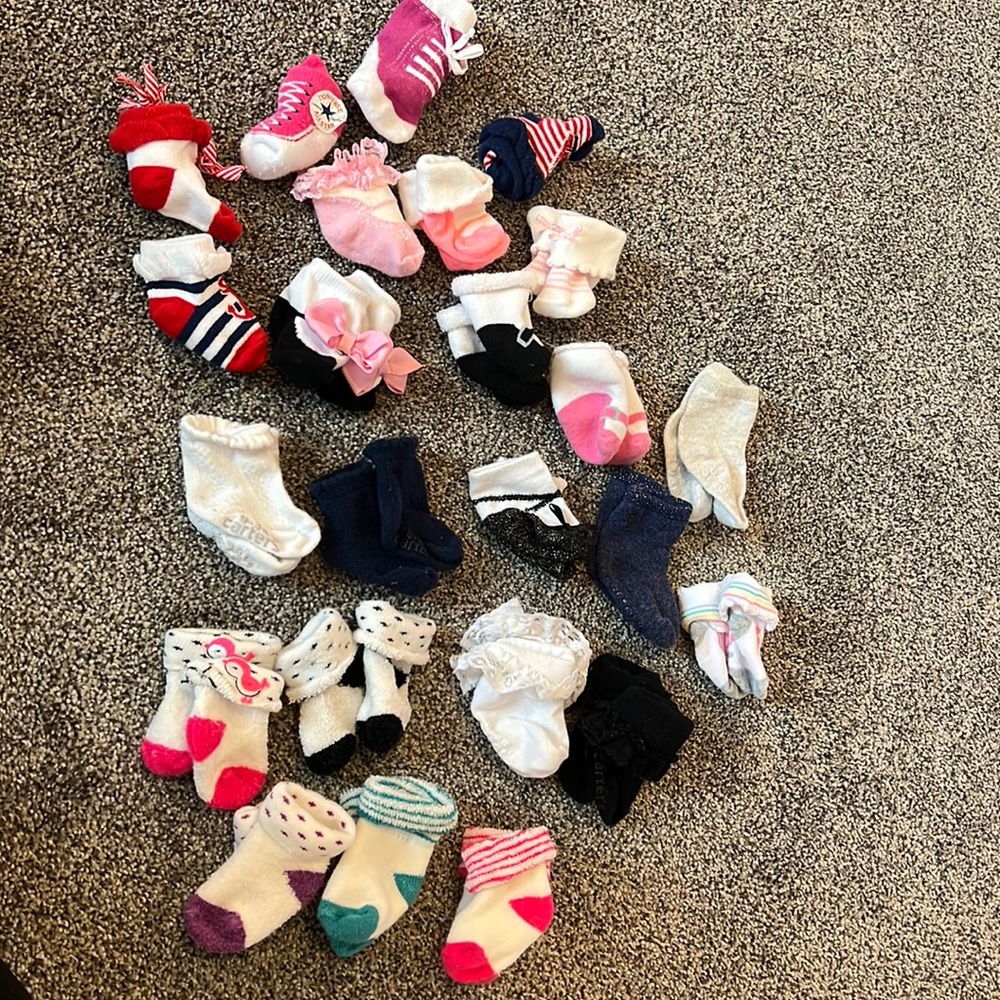 Baby girl socks newborn to 3 months. Most are like new